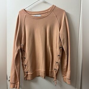Crew neck sweater with split knot sides